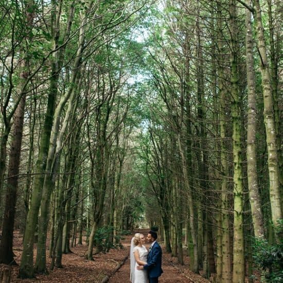 natalie-holt-central-scotland-wedding-photographer-supplier-venue-directory-bride-groom-trees-veil